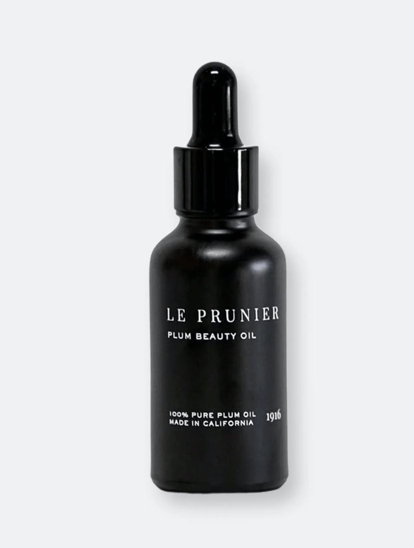 black bottle of face oil Le Prunier Plum oil