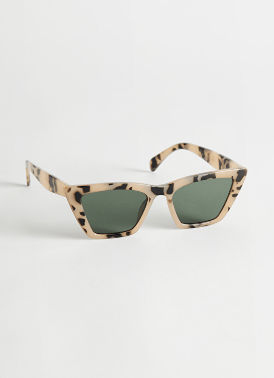 angular tortoise shell cat eye sunglasses with green lenses