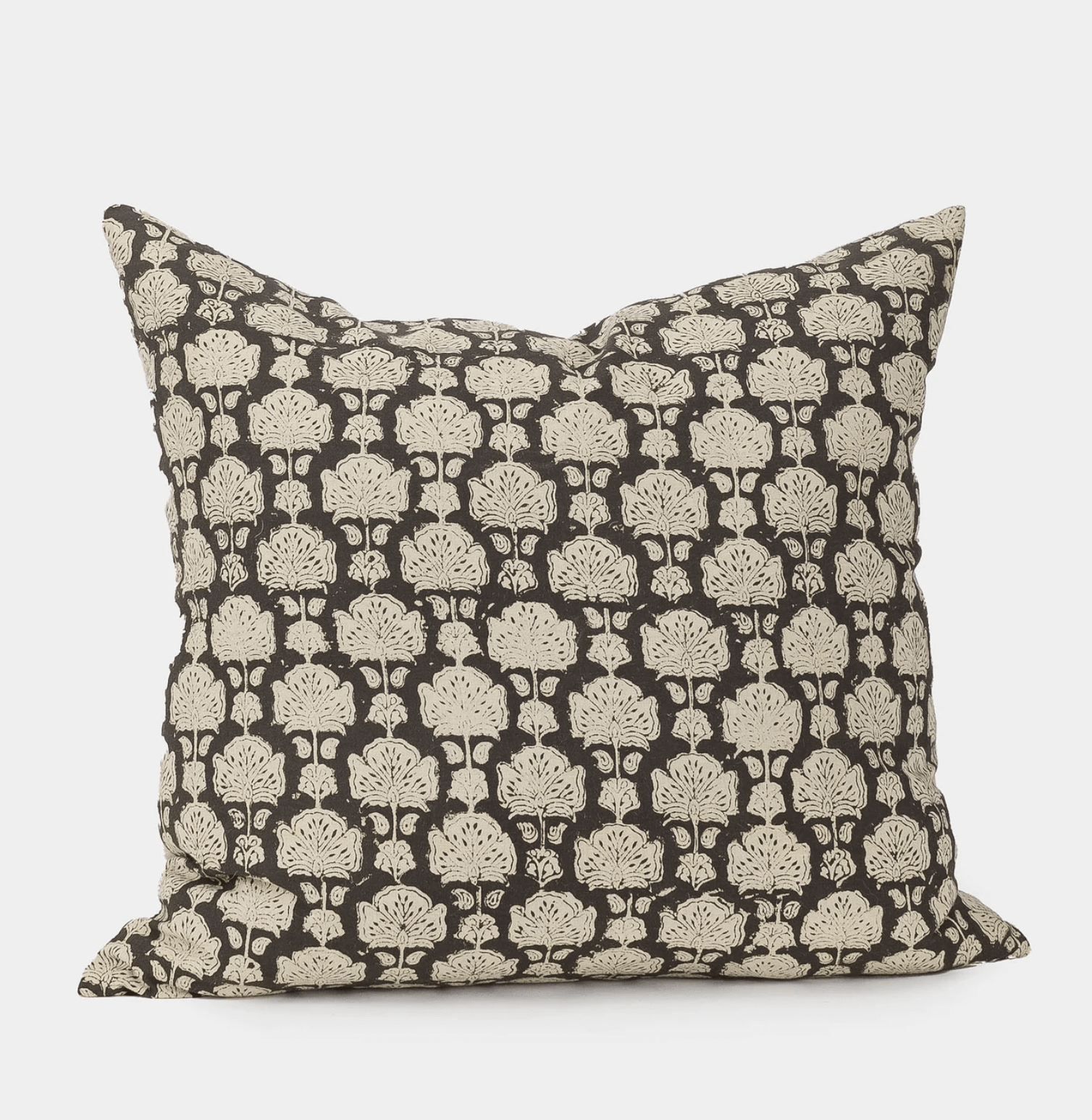patterned cream and black pillow