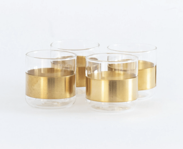 four glasses with brass stripe