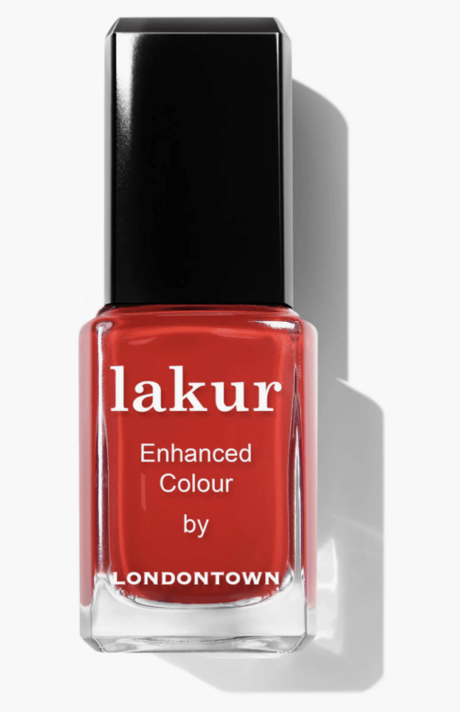 bottle of red nail polish that reads Lakur; black top