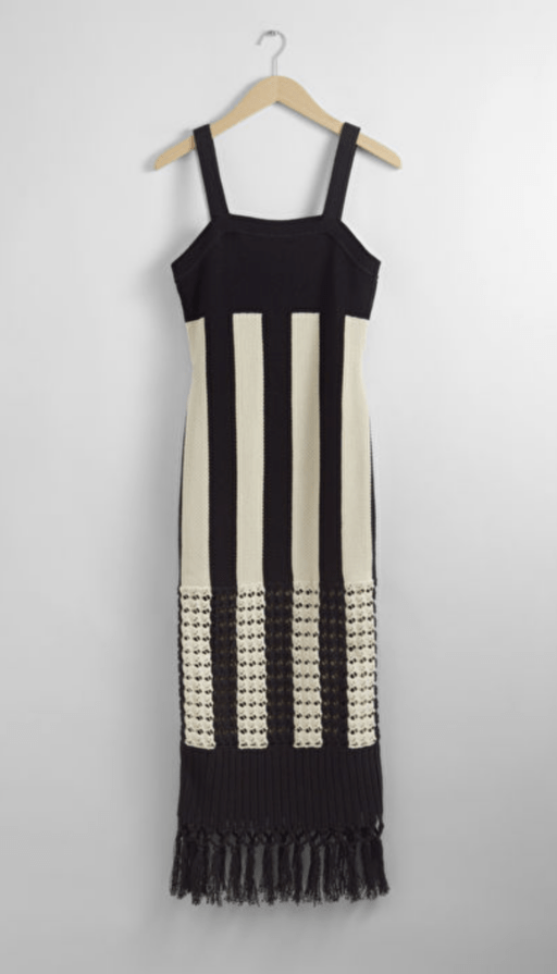 Black and white striped dress with fringe at bottom
