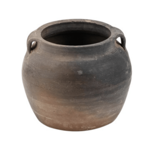 brown clay pot with two small handles on either side